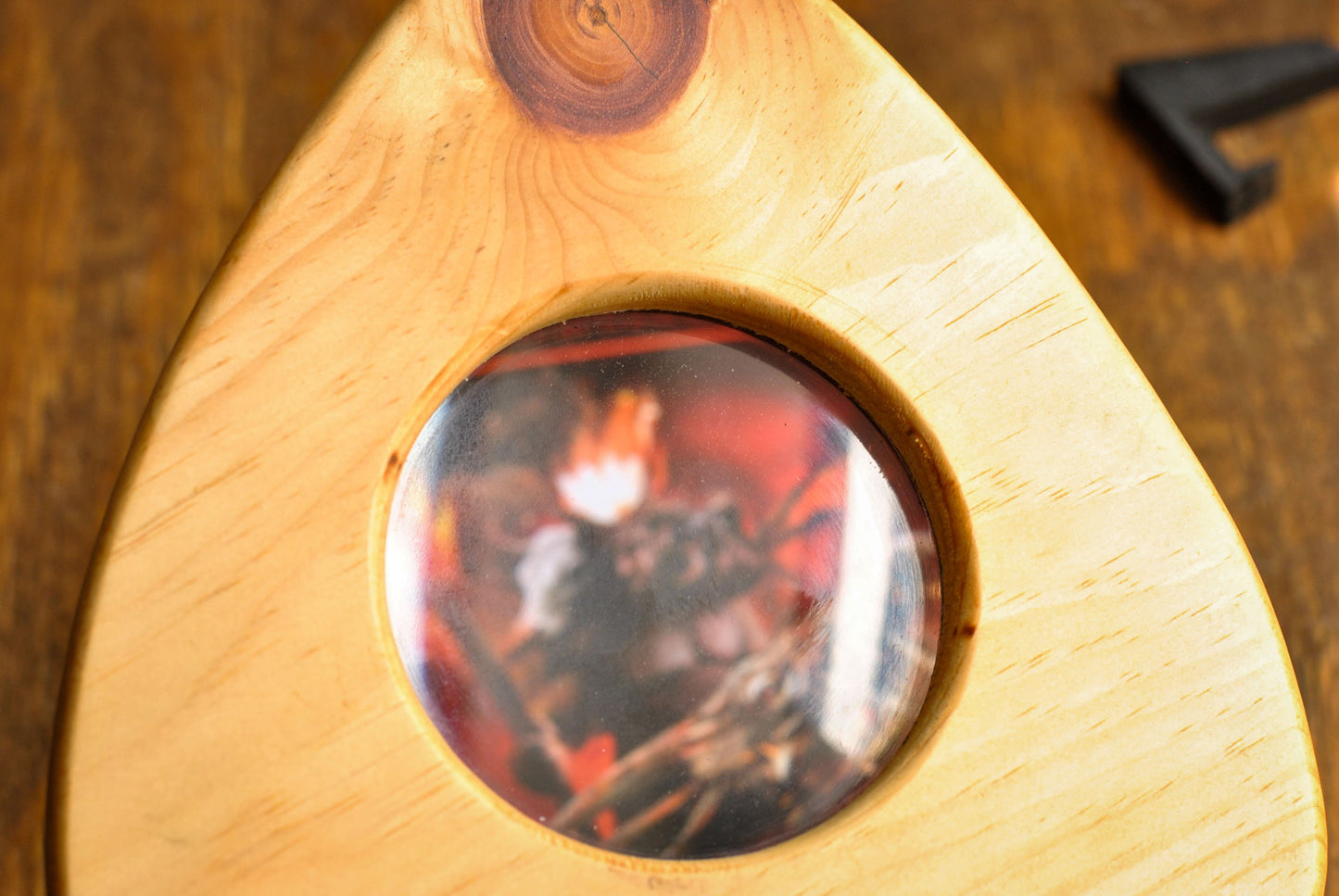 Close up view of Wooden Planchette with Real Glass Looking Lens| Ouija Planchette Wall Decor or Halloween Prop with Stand | Gothic Wall Art | Unique Horror Decor | Spooky Gifts