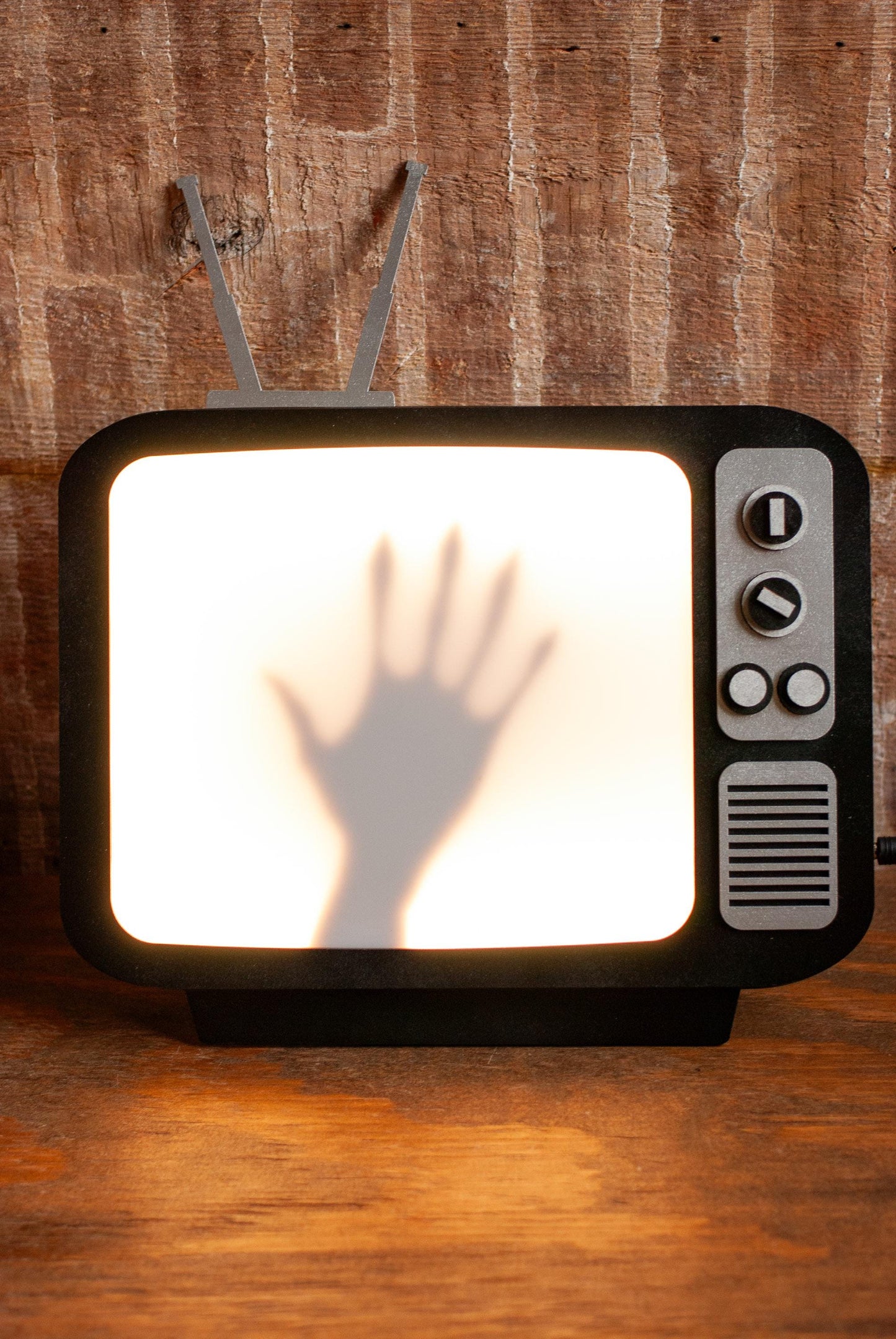 light up view of hanging wall-mount Retro TV LED Lightbox Sign with creepy hand for Horror Movie Fans, Gamers, Bedroom or man cave - wood and acrylic - light up wall art