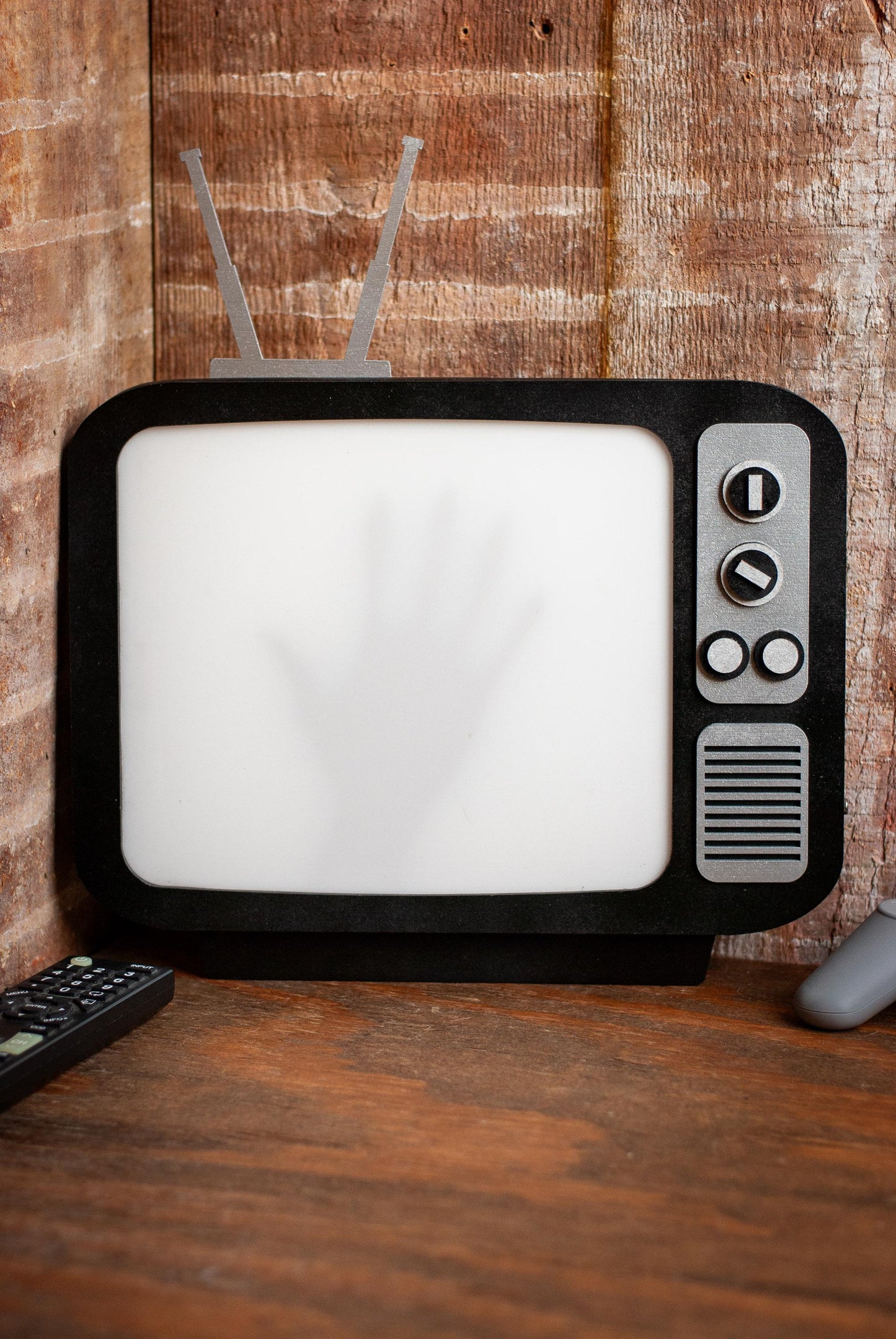 front view of Retro tube TV LED Lightbox Sign with creepy hand shadow box for Horror Movie Fans, Gamers, Bedroom or man cave - wood and acrylic - light up wall art