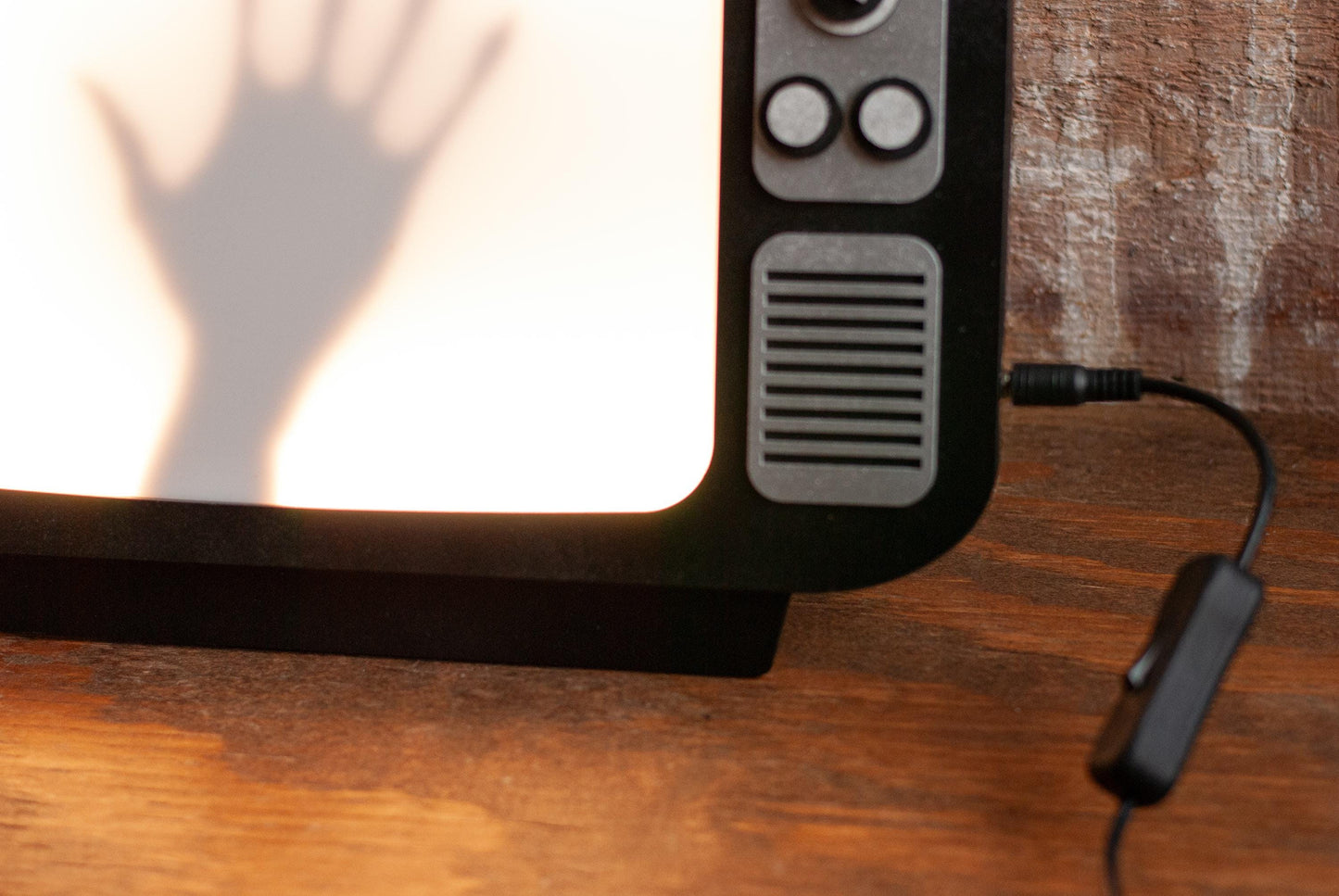 close up of light switch for Retro TV LED Lightbox Sign with creepy hand shadow box for Horror Movie Fans, Gamers, Bedroom or man cave - wood and acrylic - light up wall art