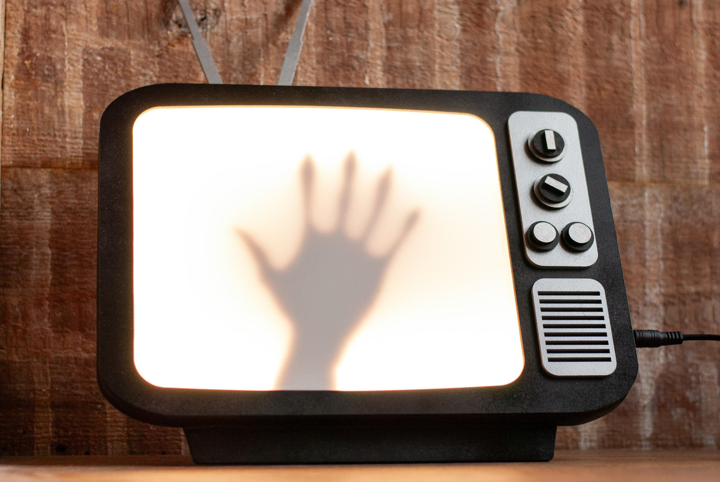 front view of light up Retro TV LED lamp with creepy hand shadow box for Horror Movie Fans, Gamers, Bedroom or man cave - wood and acrylic - light up wall art