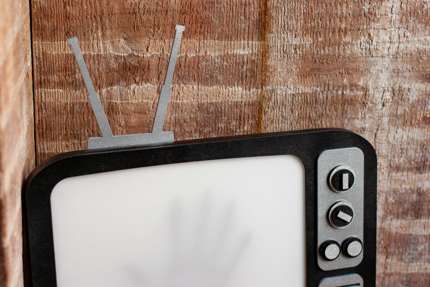 close up of antenna for Retro TV LED with creepy hand shadow for Horror Movie Fans, Gamers, Bedroom or movie room - wood and acrylic - light up wall art
