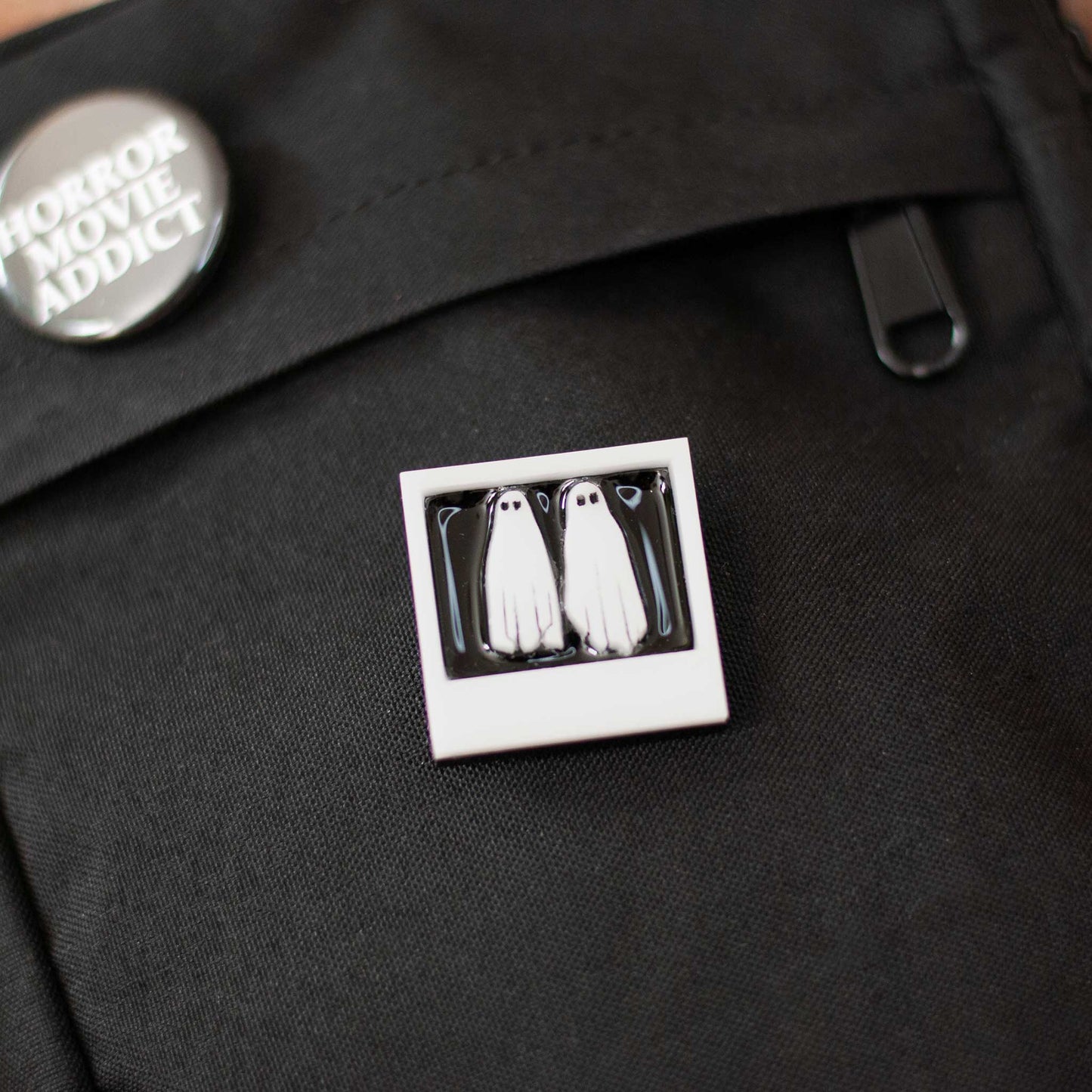 polaroid no feet ghosts pin on black bookbag
