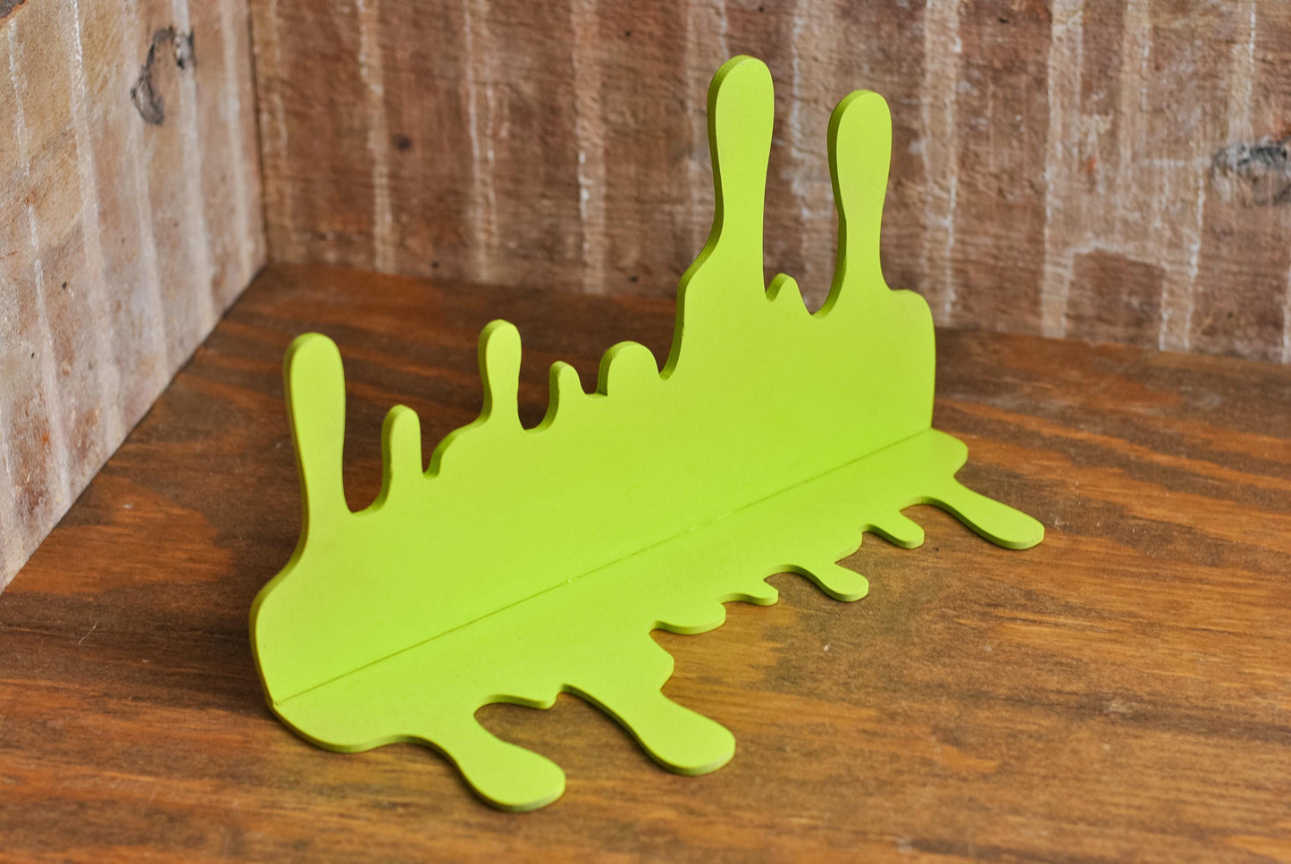 Bottom detailed view of Slime Drip Shelf Accent, 90s Nostalgic shelf sitter, Spooky Decor, Accessory for Bookshelf, Display Shelf, or Mantel, Goosebumps inspired decor