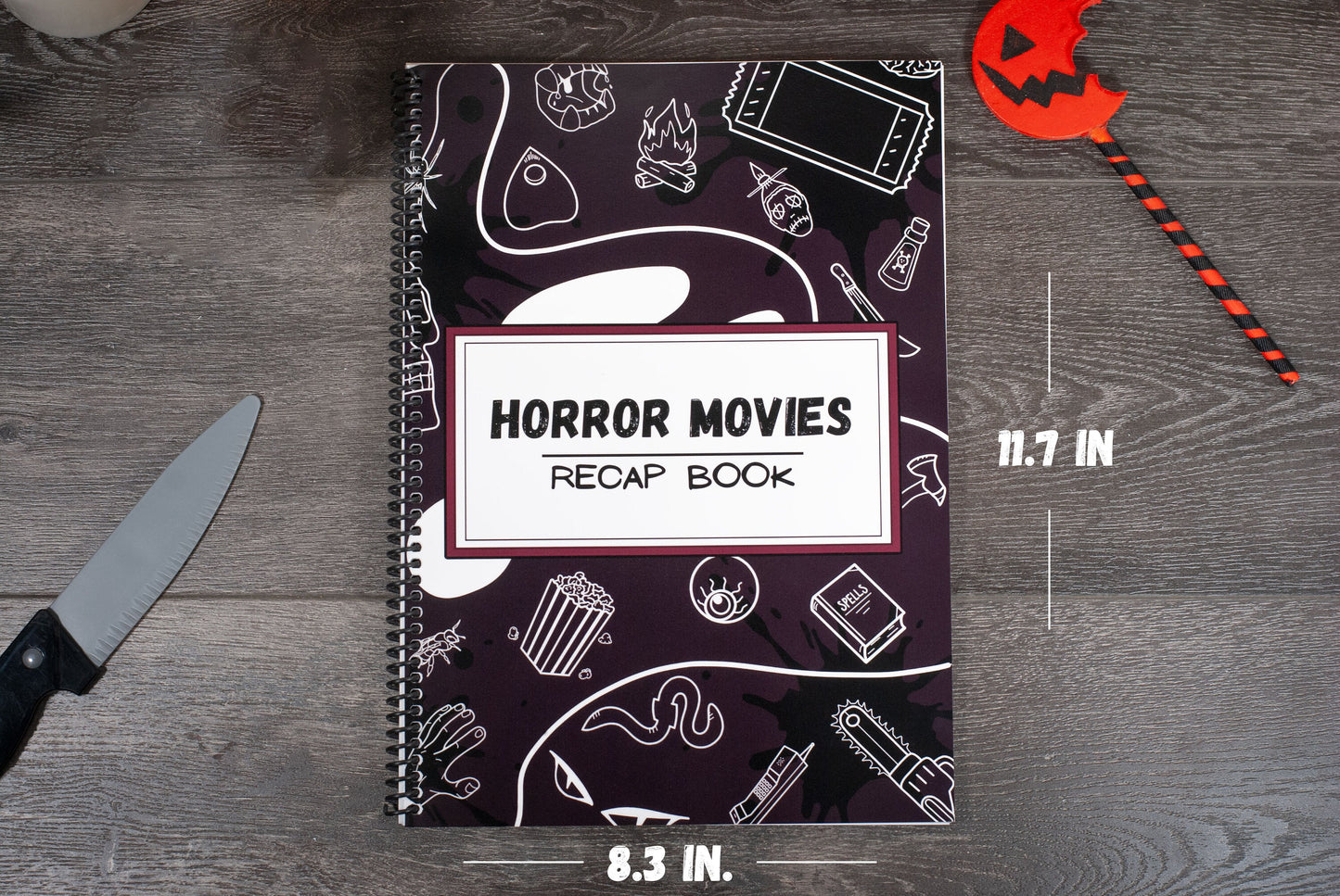 top down view of Horror Movies Recap book a spiral notebook movie review journal on wooden table displaying dimensions