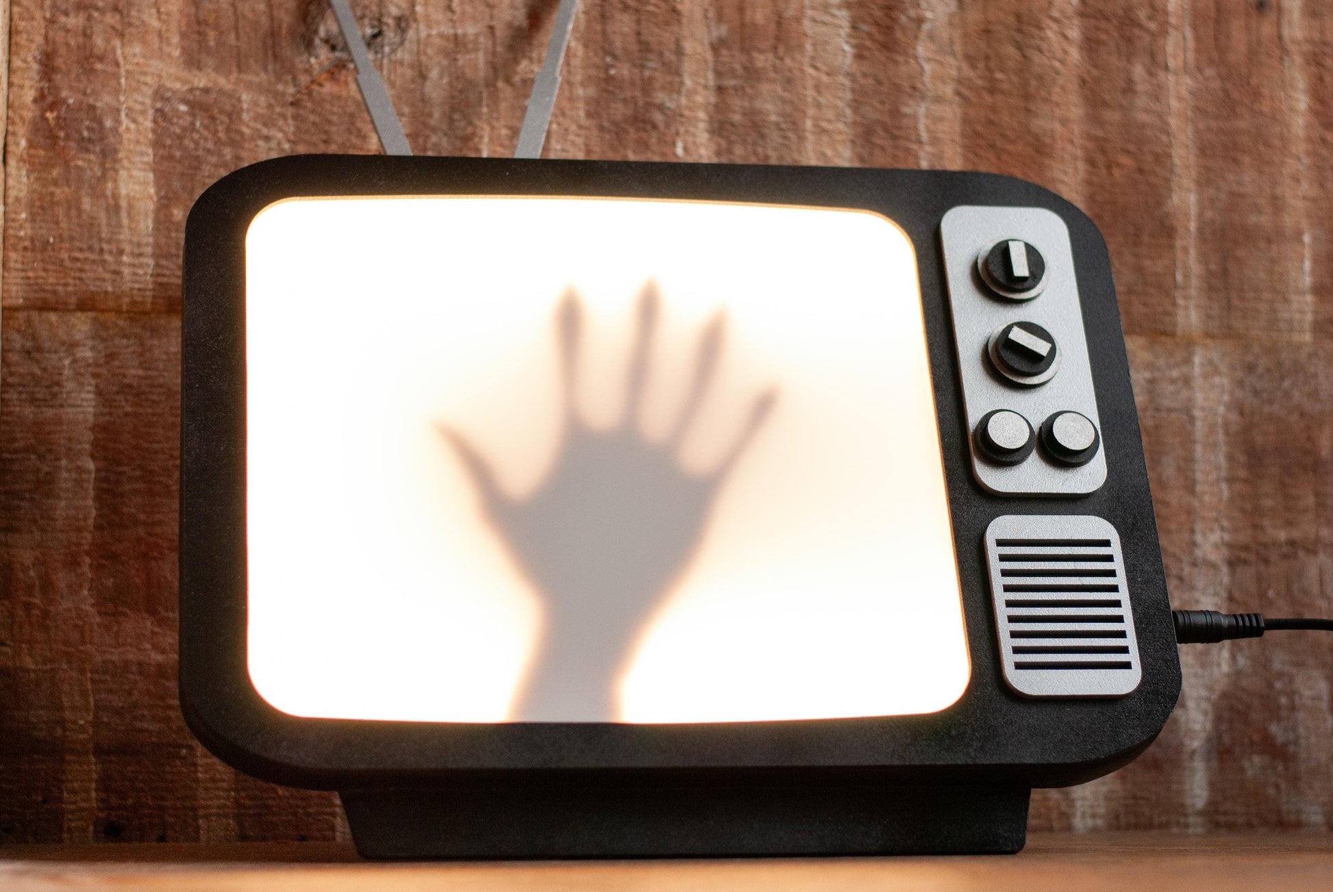 front view of light up Retro TV LED lamp with creepy hand shadow box for Horror Movie Fans, Gamers, Bedroom or man cave - wood and acrylic - light up wall art
