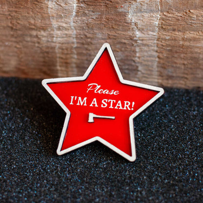 front view of wooden please, I'm a star red brooch pin for bag or shirt, pearl horror movie inspired pin, gift for horror movie fans